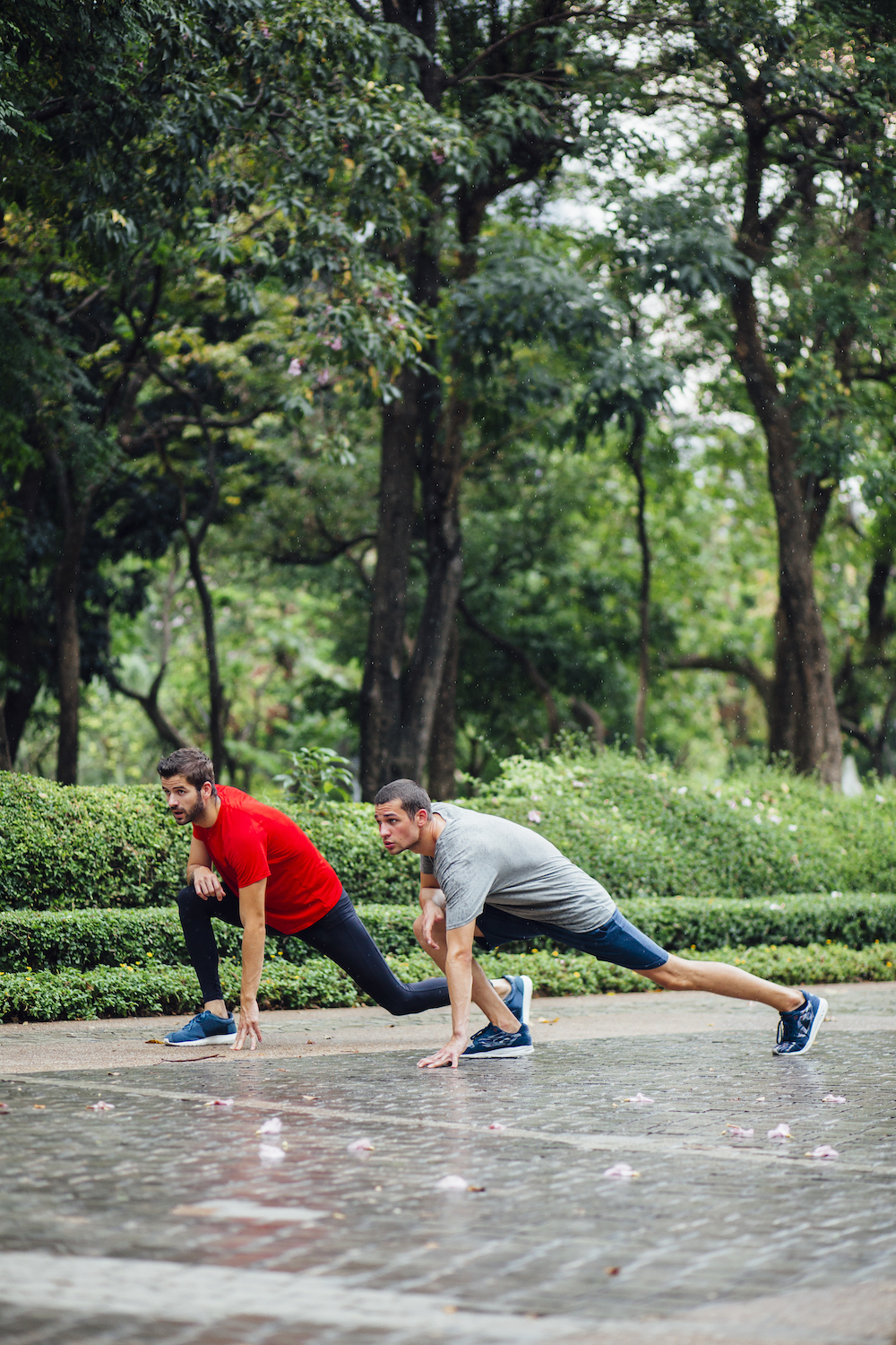 Two people stretching